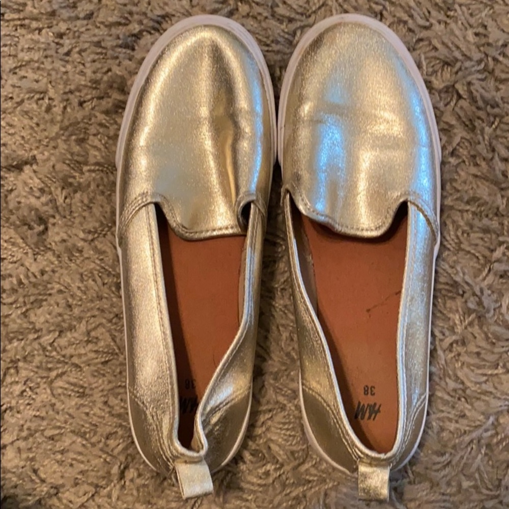 Slip on gold shoes